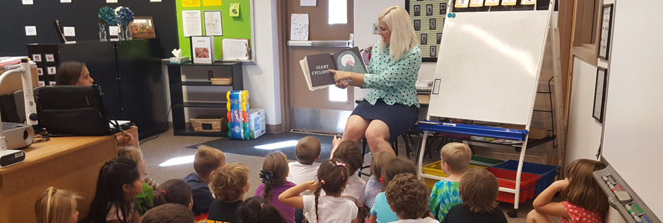 Teacher Reading to Students